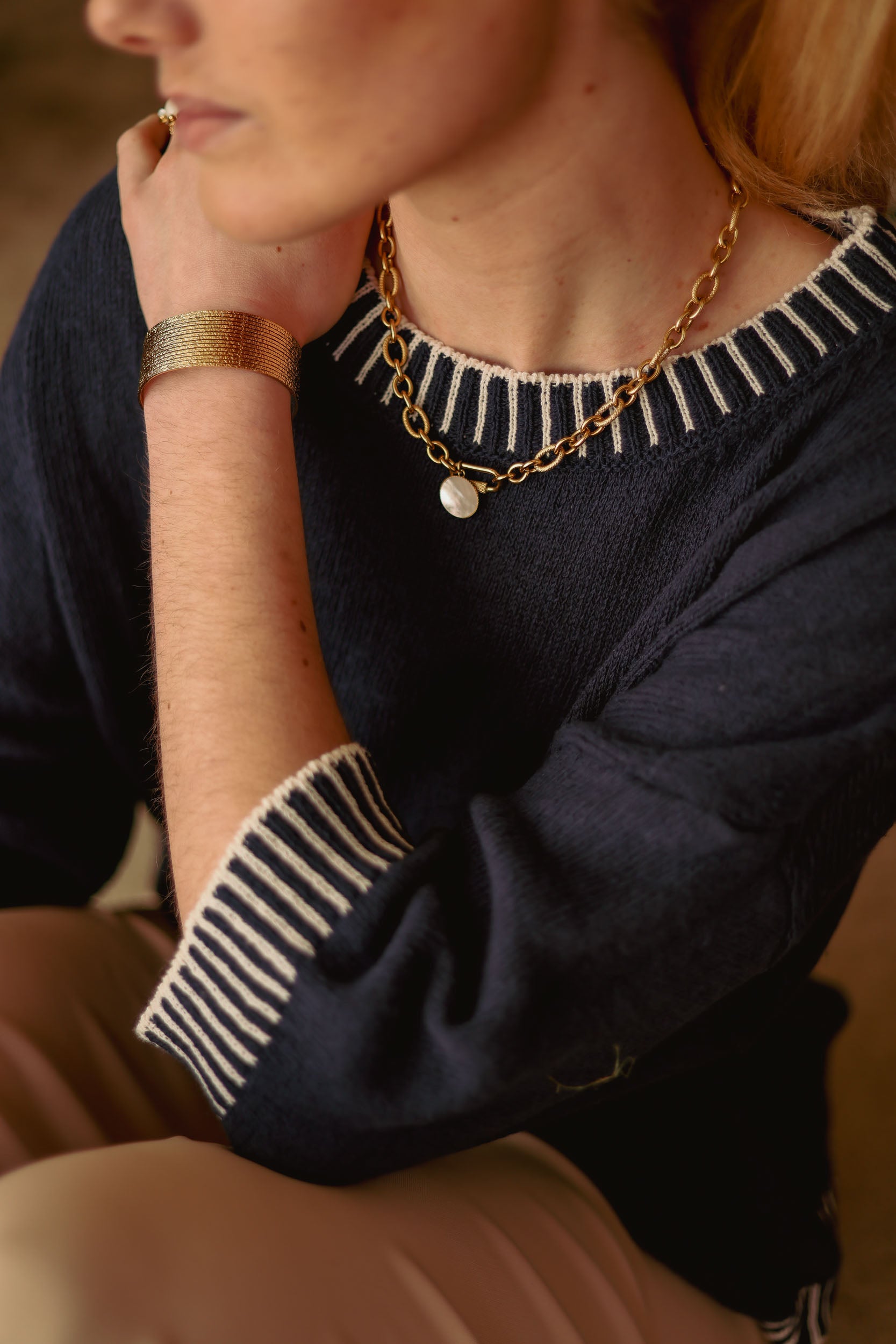Pull maille coutures