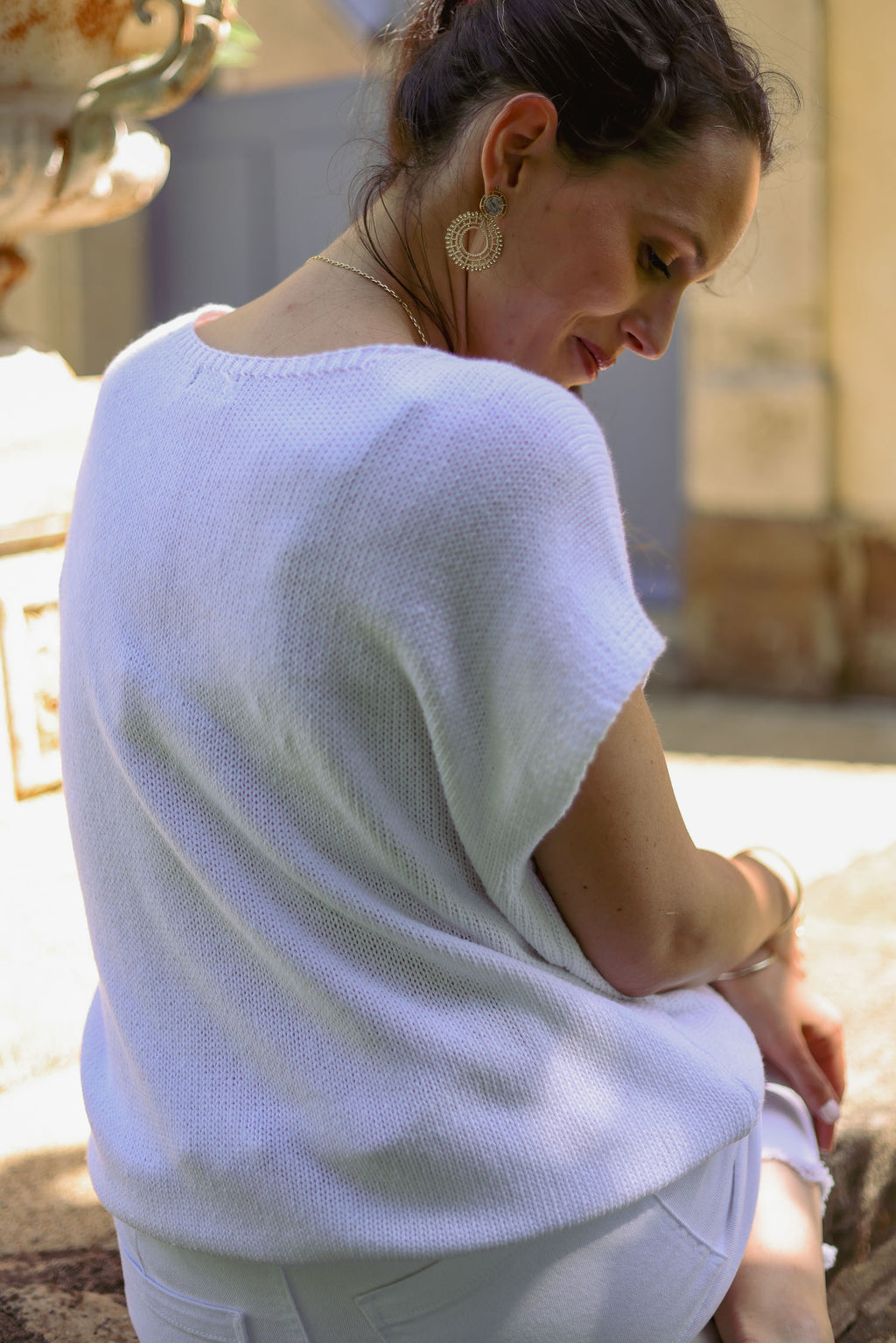 Pull uni boutons dorés
