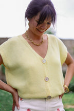 Pull uni boutons dorés
