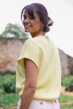 Pull uni boutons dorés