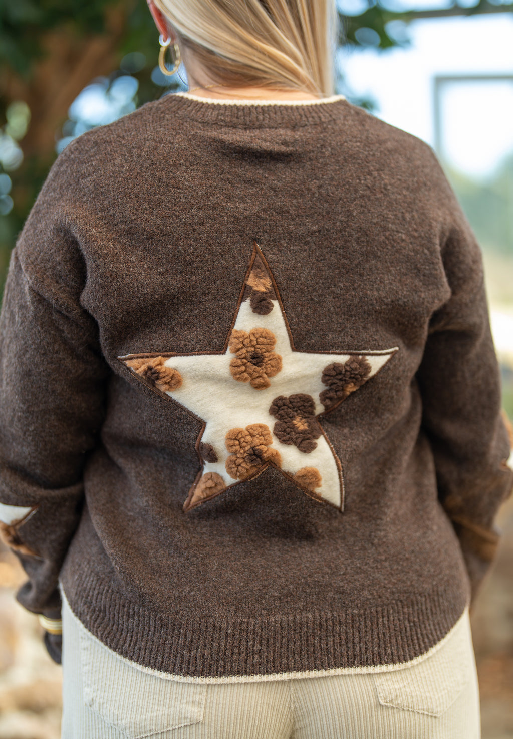 Pull étoile fleurs