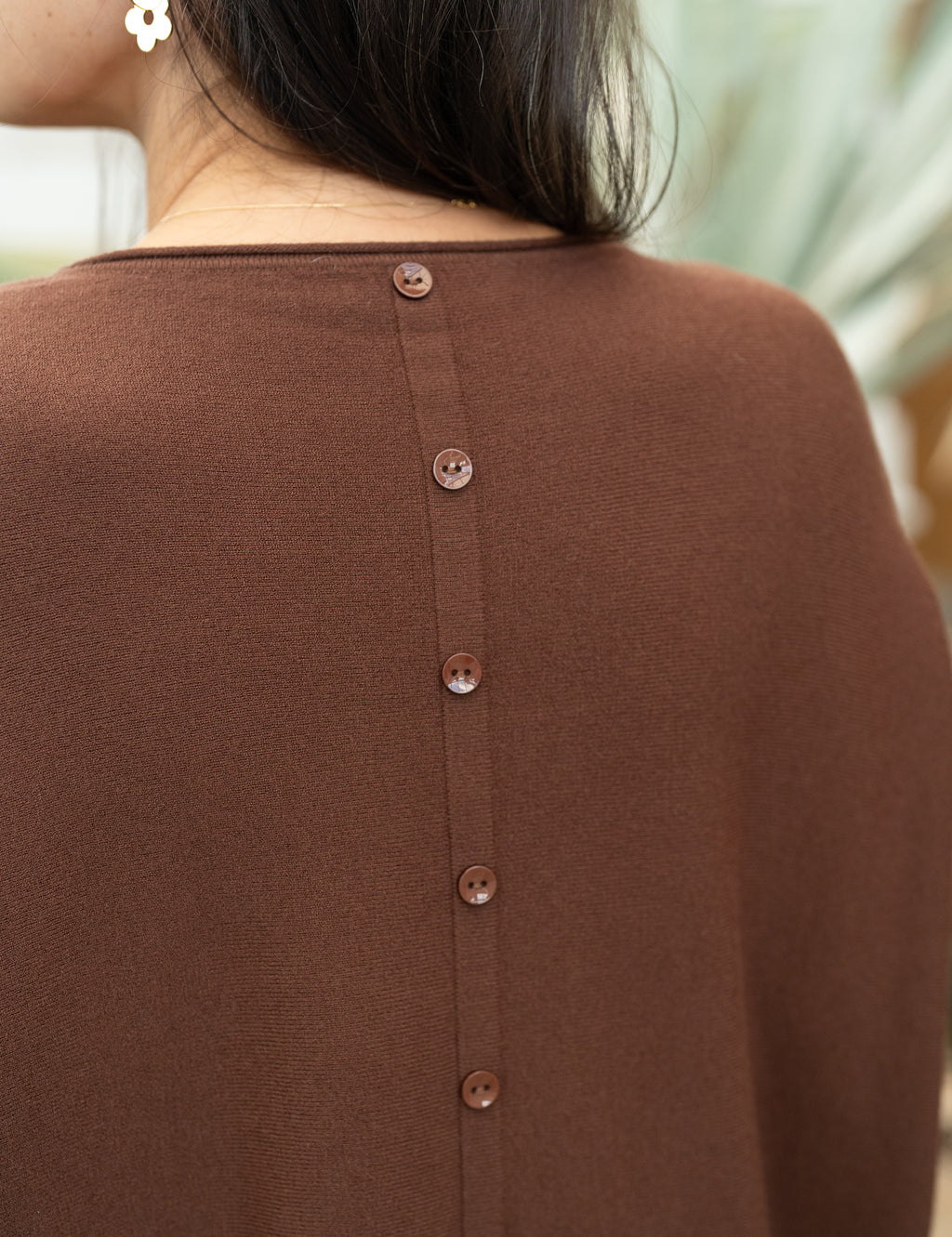 Pull boutons dos