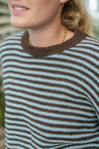Pull rayé dos noué