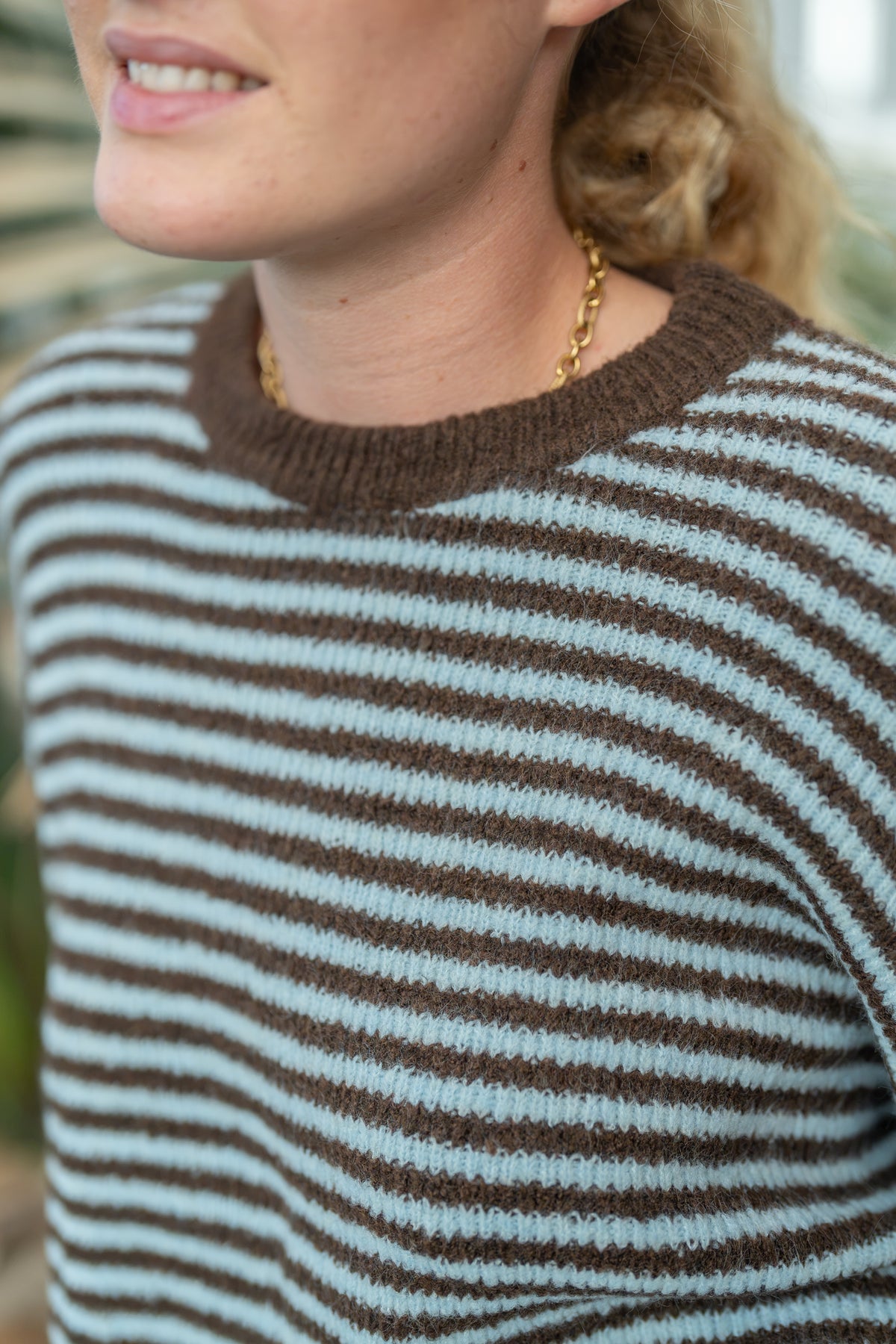 Pull rayé dos noué