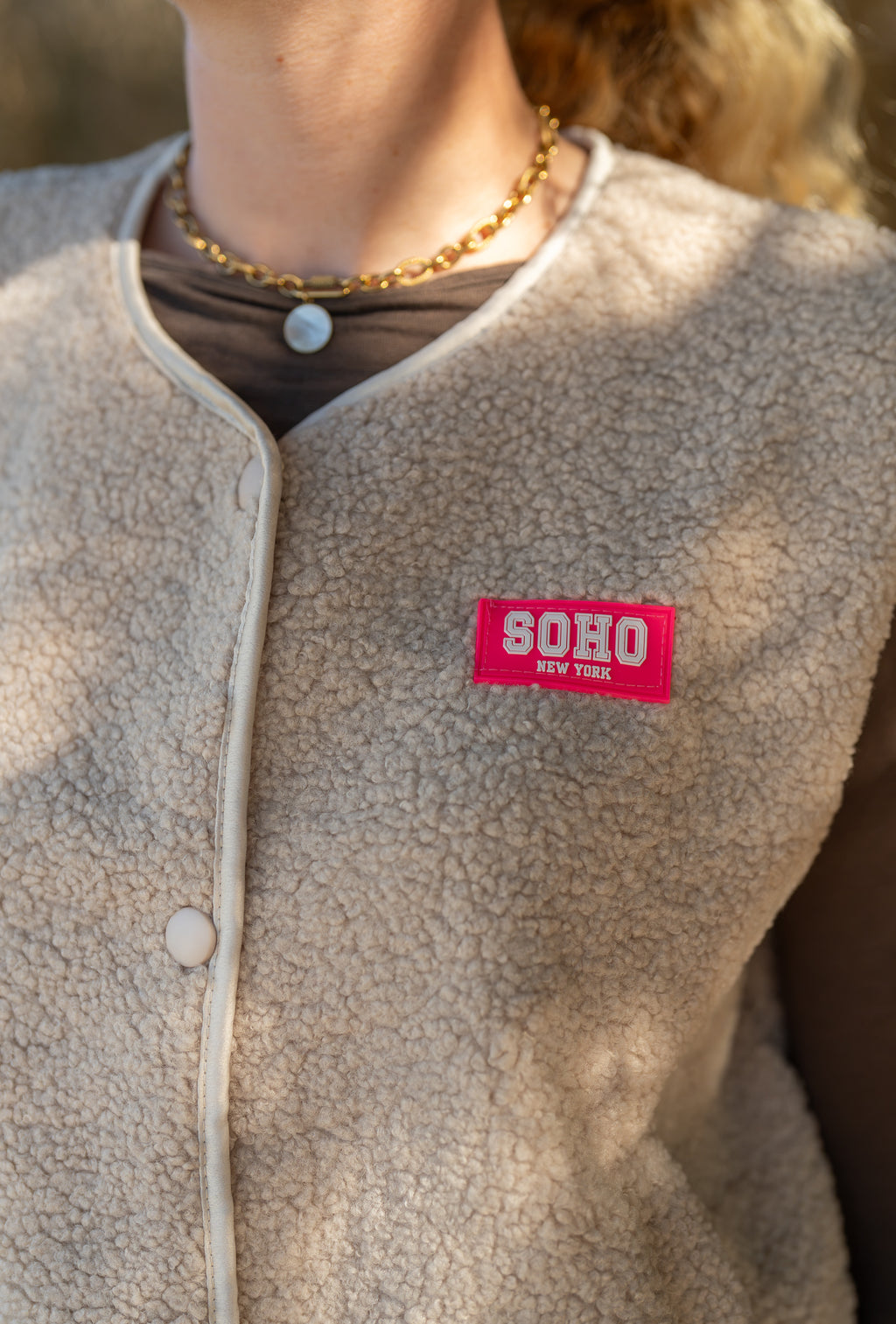 Veste moumoute sans manches