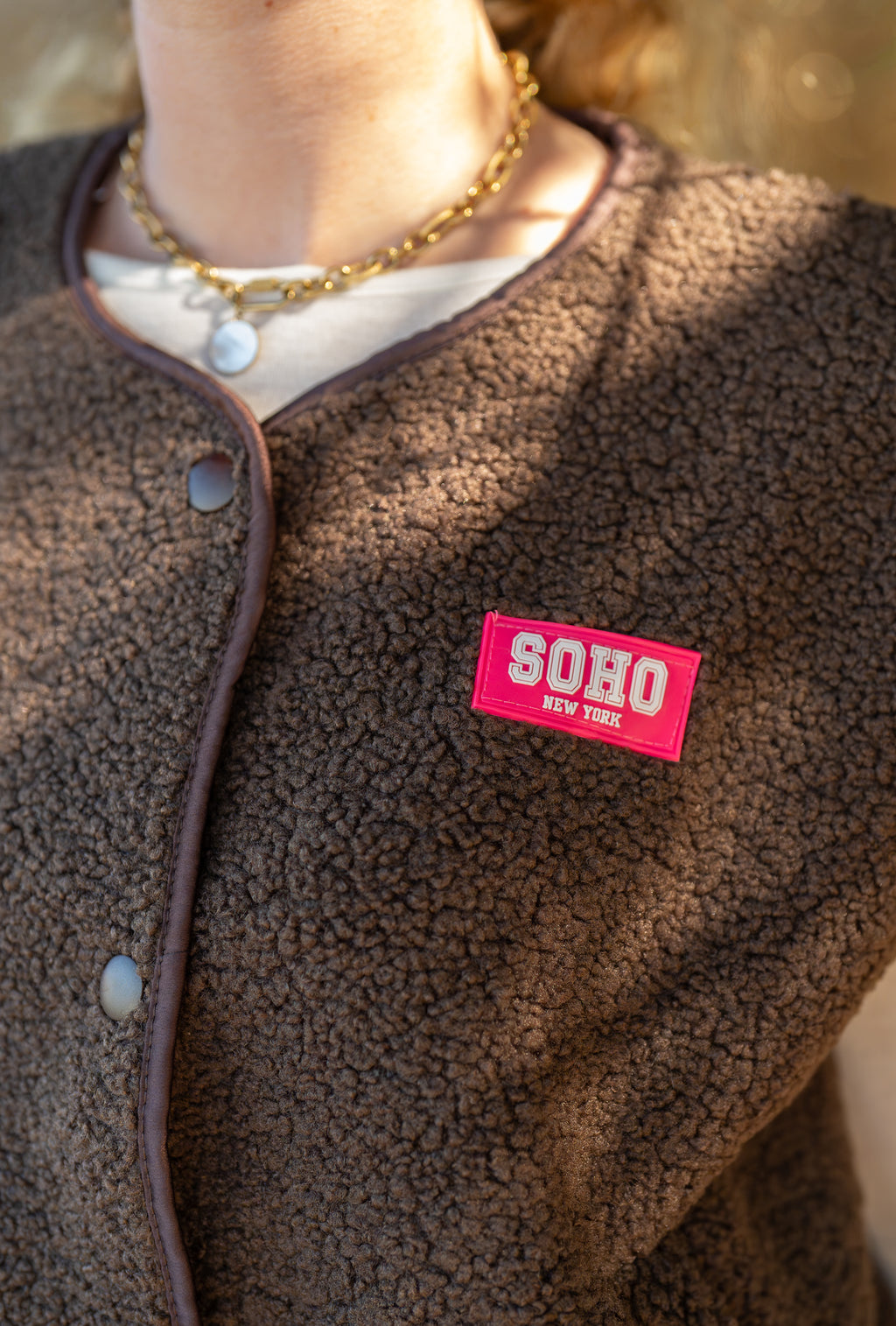 Veste moumoute sans manches