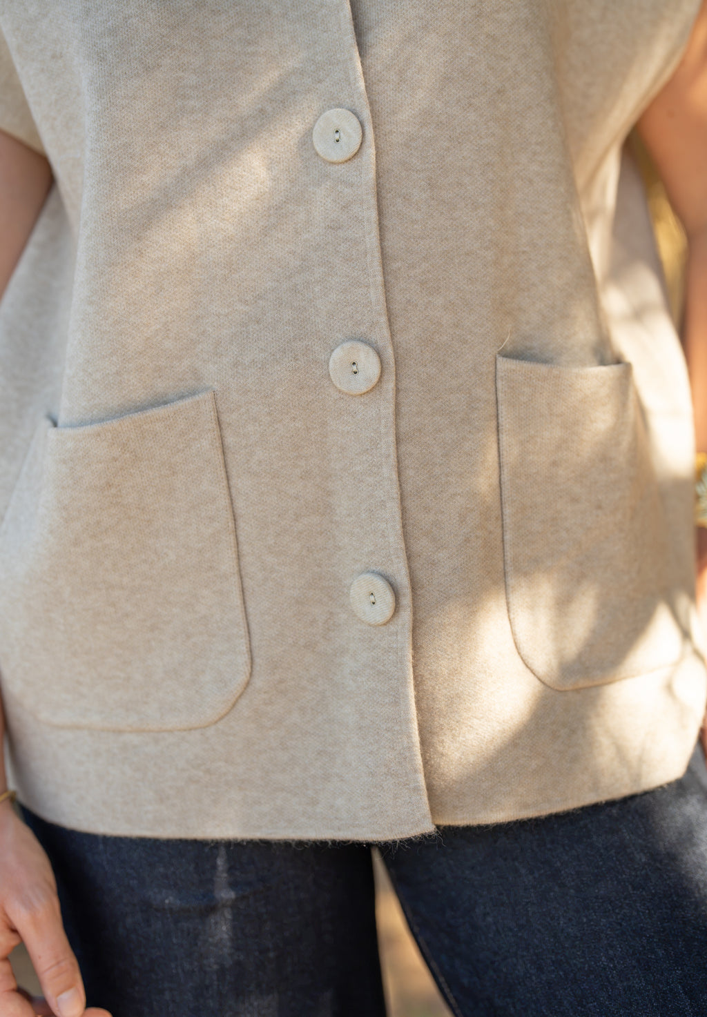 Gilet sans manches capuche