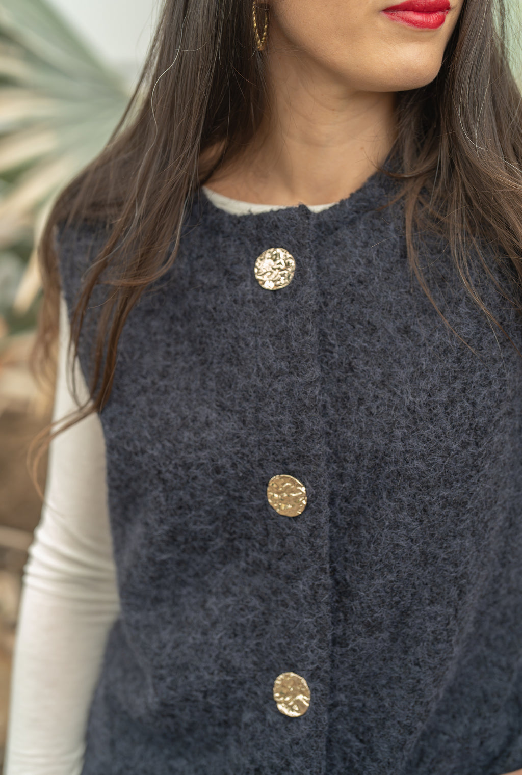 Gilet sans manches boutons